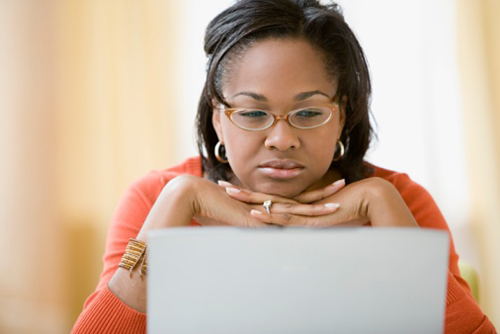 Woman looking at computer